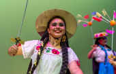 UCSC mainstage performer in traditional wardrobe of the region of Michocan-Purepecha