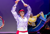 UCSC mainstage Performer in Nayarit Mestizo traditional wardrobe dancing with machetes